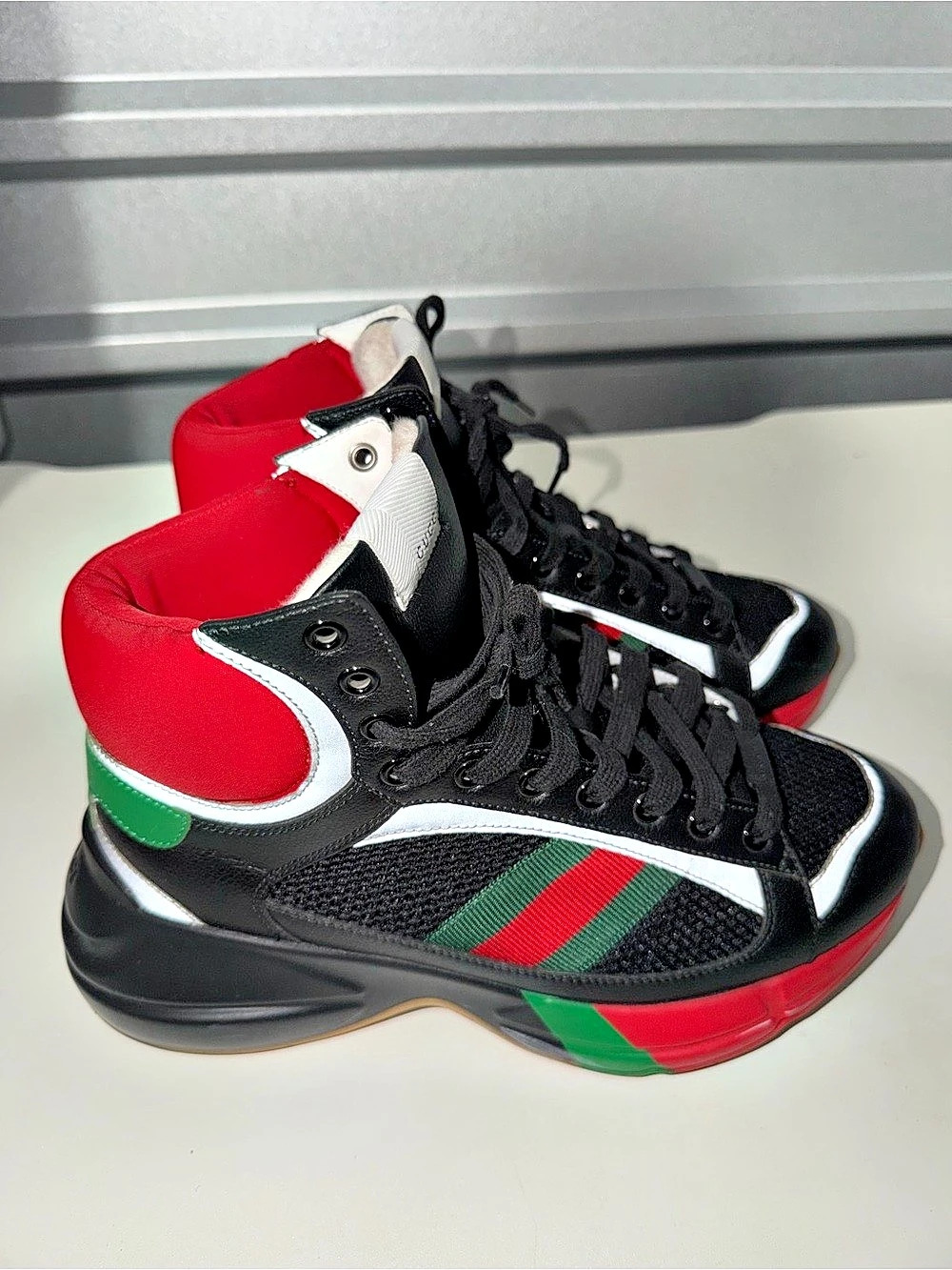 Gucci High-Top Sneakers in Black & Red